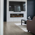 Long linear electric fireplace below a wall-mounted television